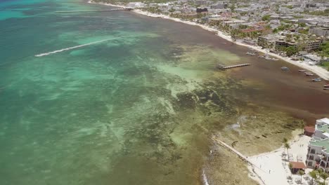 AERIAL---Beautiful-turquoise-waters-in-Cancun,-Mexico,-wide-shot-circle-pan