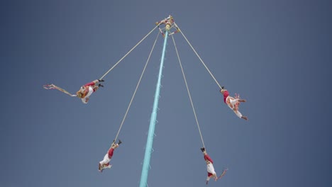 The-Voladores-de-Papantla-spectacle,-a-UNESCO-cultural-heritage,-Cancun,-Mexico