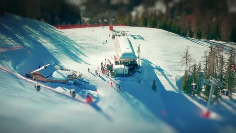 Aerial-view-of-the-upper-ski-lift-station-at-the-Passo-Furcia,-Kronplatz-skiing-resort,-South-Tirol,-Italy