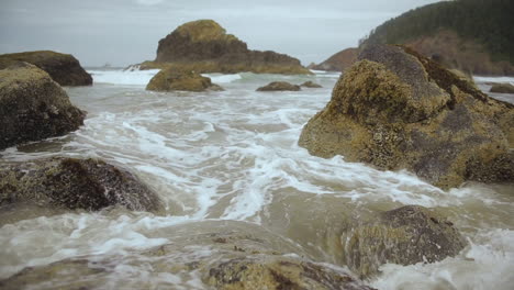 Closeup-of-waves-crashing-on-rock,-Oregon-coas