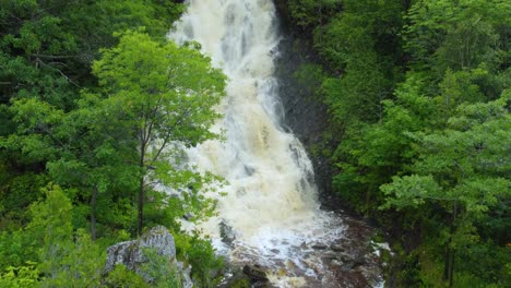 Beautiful-Canadian-Nature-Scenery-by-Waterfall-in-Beaumont,-Quebec---Aerial