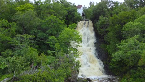 Picturesque-Canadian-Waterfall-in-beautiful-Nature-Scenery-in-Beaumont,-Quebec---Aerial