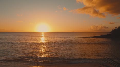 Drone-Shot-of-Sunset-on-a-Caribbean-beach
