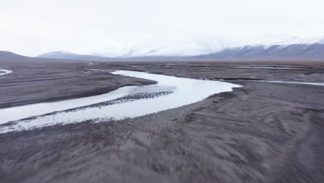Aerial-shot-of-an-alluvial-fan-in-an-arctic-valley-5