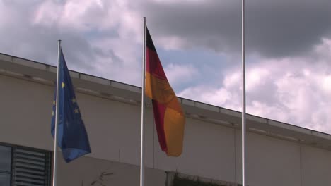 Close-up-of-flags-at-Bundeskanzleramt-in-Berlin,-Germany