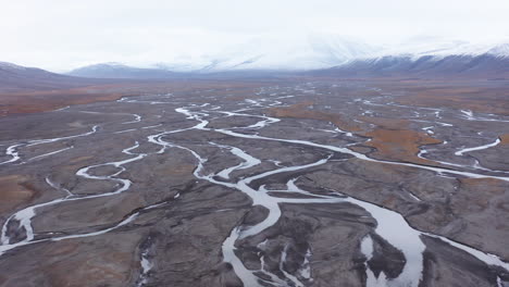 Aerial-shot-of-an-alluvial-fan-in-an-arctic-valley-8