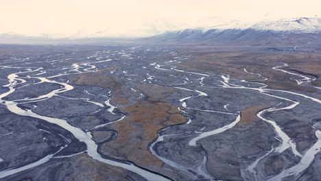 Aerial-shot-of-an-alluvial-fan-in-an-arctic-valley-1