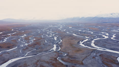 Aerial-shot-of-an-alluvial-fan-in-an-arctic-valley-3