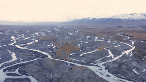 Aerial-shot-of-an-alluvial-fan-in-an-arctic-valley