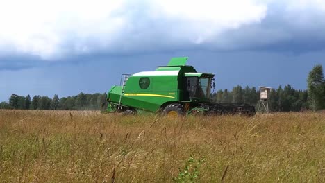 Working-in-the-field-with-Combine--_combine_farmland_Work_outdoors_summer