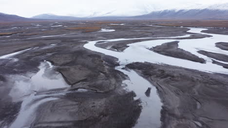 Aerial-shot-of-an-alluvial-fan-in-an-arctic-valley-4