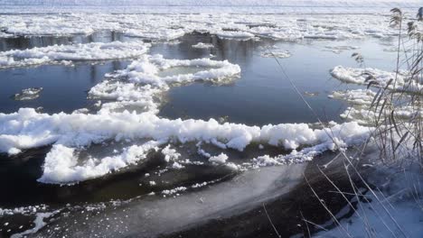 Frozen-river-with-ice-floes-shot-with-panning