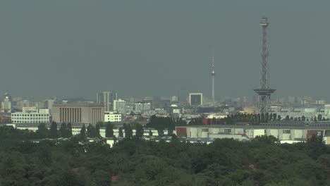 Silhouette-of-Berlin-with-TV-Tower,-Messeturm-and-Grunewald-Forest-in-front,-Germany