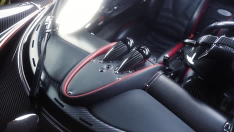 Italian-full-carbon-sport-car-dashboard-detail-in-the-dark