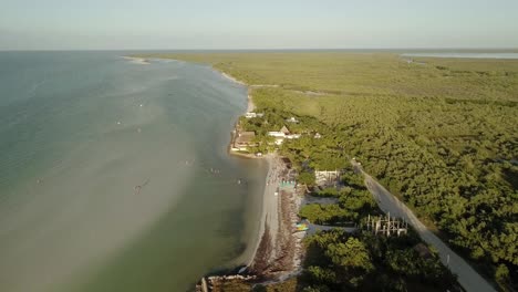 AERIAL---The-beautiful-beaches-of-Holbox-Island-in-Yucatan,-Mexico,-reverse