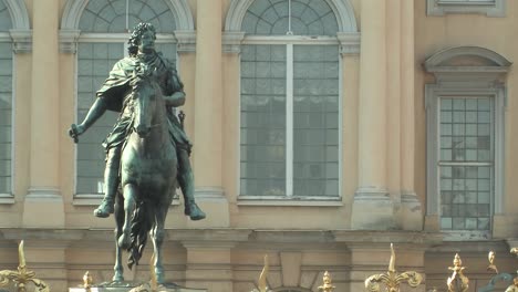 Medium-shot-of-statue-at-Charlottenburg-Palace-at-sunset-in-Berlin,-Germany-1