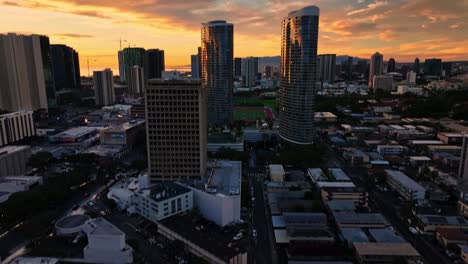 Golden-hour-drone-footage-of-a-city-high-rise