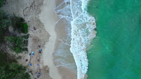 An-aerial-shot-of-people-enjoying-the-beach