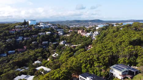 Aerial-drone-landscape-shot-of-North-Avoca-suburbs-and-Terrigal-coastline-NSW-Central-Coast-Australia-4K