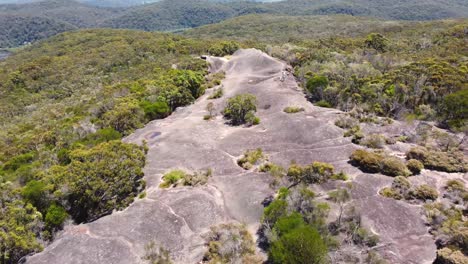 Aerial-drone-shot-of-Patonga-Beach-bushland-Elephant-Rock-formation-tourism-sightseeing-Brisbane-Water-National-Park-Central-Coast-NSW-Australia-4K
