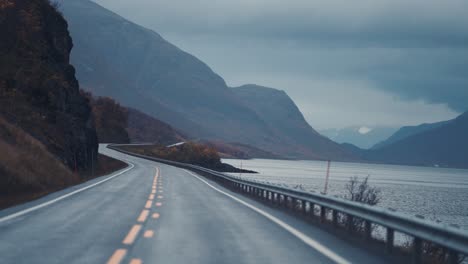 The-narrow-two-lane-road-runs-along-the-fjord