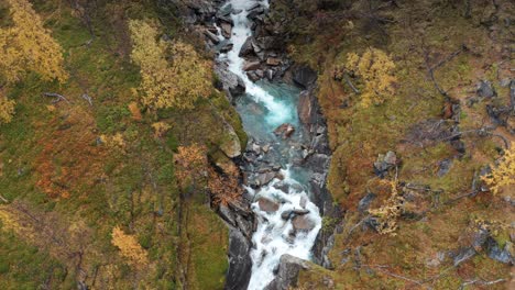 Aerial-view-of-the-wild-river-rushing-through-the-narrow-gorge