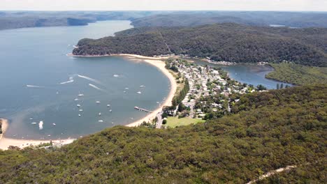 Aerial-drone-shot-of-Patonga-Beach-Bay-Bushland-Brisbane-Water-National-Park-Pacific-Ocean-inlet-Central-Coast-tourism-NSW-Australia-4K