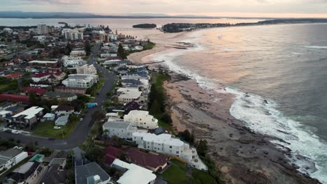 Aerial-drone-landscape-shot-of-Blue-Bay-The-Entrance-rural-town-Central-Coast-tourism-travel-Pacific-Ocean-beach-head-land-NSW-Australia-4K