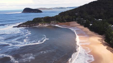 Drone-aerial-landscape-shot-of-Lion-Island-Pearl-Beach-Palm-Beach-sandy-beach-swell-waves-Central-Coast-Hawkesbury-River-tourism-NSW-Australia-4K