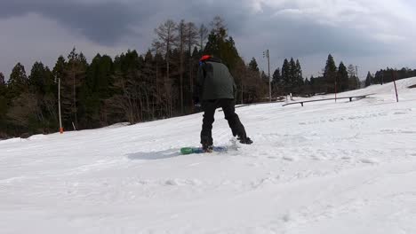 POV-point-of-view-snowboarder-on-ski-slope-downhill-park-riding-extreme-sports-Hakuba-Goryu-Japan-Asia-tourism-travel-HD