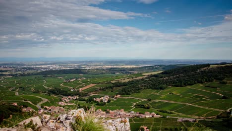 A-timelapse-shot-of-the-french-countryside-from-the-Roche-de-Solutré,-near-Mâcon,-in-Bourgogne