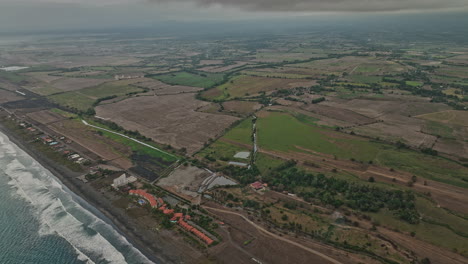 Palo-Grande-Panama-Aerial-v7-high-angle-birds-eye-view-flyover-pacific-coast-capturing-coastal-beach-and-terrain-landscape-with-fertile-farmland-on-a-stormy-day---Shot-with-Mavic-3-Cine---April-2022