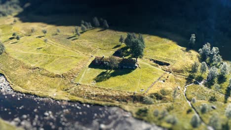 Aerial-view-of-the-traditional-sod-roof-house-on-the-river-bank