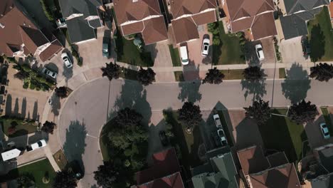 Top-down-aerial-drone-footage-of-colorful-suburban-homes