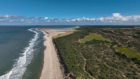 Wide-aerial-view-of-a-sandy-shoreline-with