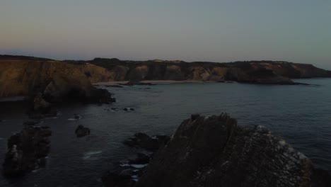 Spectacular-sunset-beyond-the-rugged-Portugal-coastline-orbit