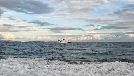 Luxury-boats-speeding-through-deep-blue-ocean-with