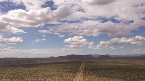 Vast-Southern-Arizona-landscape-with-road-leading-into