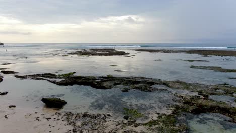 Majestic-view-of-Bali-island-coastline-with-crashing