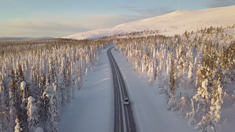 Cars-driving-on-a-winter-road-in-the