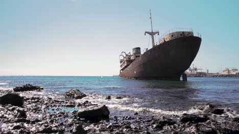 Post-apocalyptic-scene-of-a-ship-stranded-on