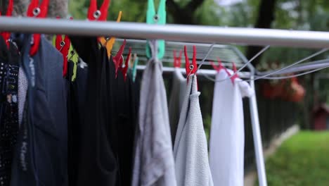 close-up-of-spreading-laundry-out-to-dry