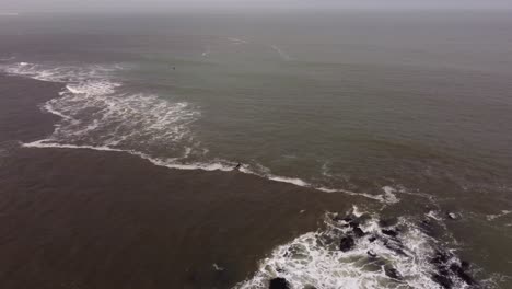 Isolated-surfer-enters-Atlantic-Ocean-waters-of-Punta