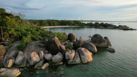 rocky-coastline-at-sunset-with-granite-boulders-and