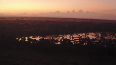 Silhouette-of-paddy-fields-at-sunrise-during-golden