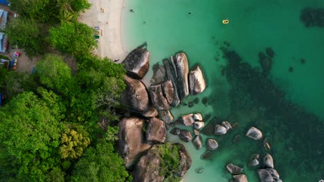 aerial-top-down-of-tropical-island-coastline-with