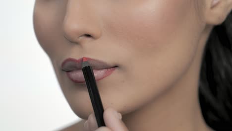 Professional-Cosmetic-Makeup-Being-Applied-To-Model's-Lips