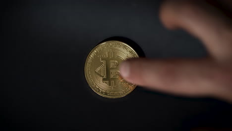 A-close-up-shot-of-golden-bitcoin-being