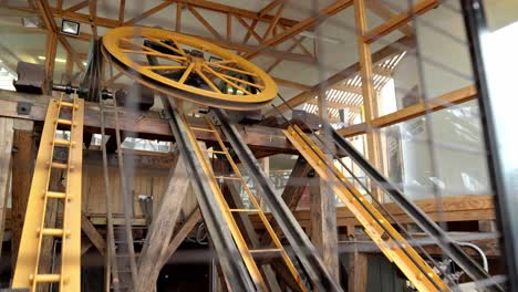 Downhill-view-of-a-yellow-wheel-pulley-in