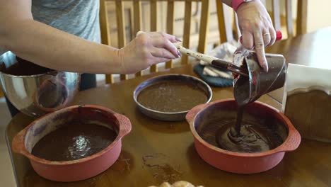 Pouring-cake-batter-into-a-silicone-baking-pan